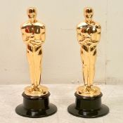 PAIR OF HOLLYWOOD STYLE TROPHY ORNAMENTS.