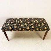 WINDOW SEAT IN LEMON TREE PATTERN UPHOLSTERY.