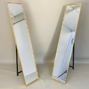 PAIR OF CHEVAL DRESSING MIRRORS WITH GILT FRAMES AND BEVELLED PLATES.