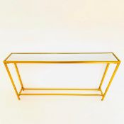 GILT METAL CONSOLE TABLE WITH MIRRORED GLASS TOP.