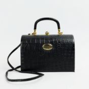 A GIANNI VERSACE BLACK BOX BAG.