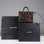 AN YVES SAINT LAURENT SAC-DE-JOUR HANDBAG.