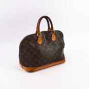 A LOUIS VUITTON MONOGRAM HANDBAG.