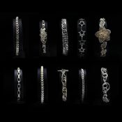 A COLLECTION TEN STERLING SILVER BRACELETS.