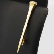 A HERMES YELLOW METAL TIE PIN.