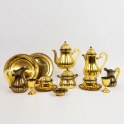 A SILVER-GILT TEA AND COFFEE SERVICE.