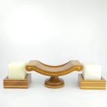 DAVID LINLEY EARLY COLLECTION WALNUT FRUIT BOWL AND MATCHING CANDLESTICKS. (3)