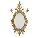 LATE GEORGE III GILTWOOD OVAL MIRROR