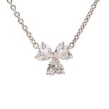 Cartier: A tri-stone diamond pendant necklace
