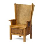 A SCOTTISH STAINED PINE ORKNEY CHAIR
