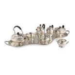 AN EDWARDIAN MATCHED EIGHT PIECE TEA SERVICE