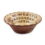 A SEATON POTTERY SGRAFFITO DECORATED BOWL