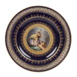 A late 19th or early 20th century Meissen cobalt blue ground cabinet plate with a pierced border,