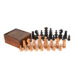 A 19th century ebony and boxwood chess set the king 10.5cm high