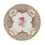 An 18th century Crown Derby porcelain plate with painted decoration attributed to James Banford
