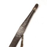 A 19th century Omani Kattara sword with a 74cm broad single edge curved blade with two fullers,