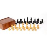 An early 20th century Staunton ebony and boxwood chess set the king 8.5cm high