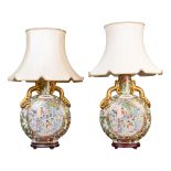 A pair of Chinese porcelain famille vert moon flasks converted for use as table lamps