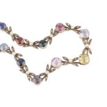 An early 20th century 'harlequin' gem set necklace, the graduated rivière set with a combination