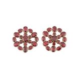 Two early 19th century garnet jewels, each of the pierced circular panels set throughout with
