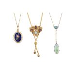 An early 20th century opal and seed pearl pendant, set with two oval opal cabochons, spaced by a