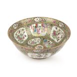 A large 19th century Chinese Canton bowl with extensive decoration 37cm diameter 15cm high One rim