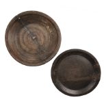 Two large antique turned oak dairy bowls the largest 64cm diameter