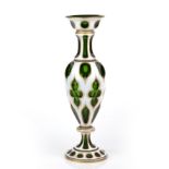 A 19th century Bohemian overlay glass vase, white over green with gilding 36,5cm high Additional