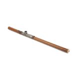 A 19th century Chinese bamboo opium pipe with ivory end and mouthpiece with a silver saddle engraved