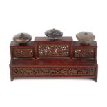 A 19th century Chinese, hardwood bowl stand with pierced decoration 30cm wide x 13.5cm high, and