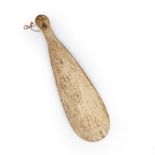 An early 19th century Patu Parāoa, Mãori, New Zealand, whalebone club, 42cm 11.5cm deep. Provenance:
