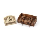 An early 20th-century Chinese boxwood model of opium smokers 11cm deep 15.5cm wide and a soapstone