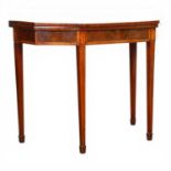 A 19th century mahogany card table with marquetry and boxwood inlay and tapered legs, 97x74x48cm