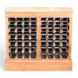 A bespoke made pine wine rack, on a plinth base 93w x 33d x 85h cm