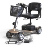 A KforU electric mobility scooter, with charger Starts and runs