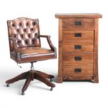 A brown leather button back swivel desk chair, together with a narrow chest of drawers, 64cm wide (