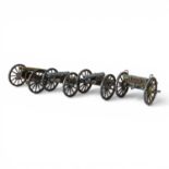 A scale model field gun carriage together with three model cannons (3)