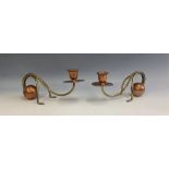 A pair of German Jugendstil (Art Nouveau) copper and brass cantilever candlesticks by Carl Deffner