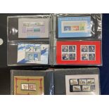 STAMPS AUSTRALIA Two albums of presentation packs, great thematic interest 98 different packs