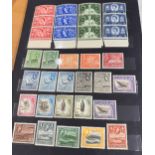 COLLECTABLE STAMPS British Commonwealth mint accumulation in blue stock book QEII to 1970's, no