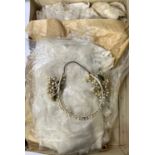 A vintage lace wedding dress with accessories in box, a vintage pair of Perrin gloves, a selection