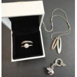 A Thomas Sabo pig charm; a Pandora Elegance ring and another similar twisted eternity style ring;