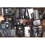 A collection of cameras inc. Canon, Kodak, Printz Condor, Pentax.