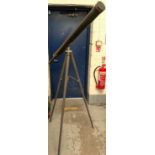 A 19th century brass telescope on later stand (in need of some attention)