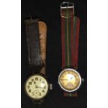 A WW1 officers trench style watch silver cased and a mid century gents Record watch