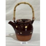 William 'Bill' Marshall (1923-2007) A rare earthenware teapot, slipware spotted decoration on an