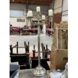 A floor standing five light candelabrum of contemporary design. 35in high