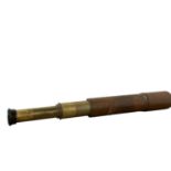 NEGRETTI & ZAMBRA BRASS THREE DRAW TELESCOPE, EARLY 20TH CENTURY, AND A TAPE MEASURE