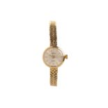 GARRARD, NINE CARAT GOLD QUARTZ WRIST WATCH