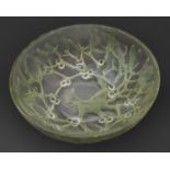 "Gui." A Lalique moulded and green stained glass bowl, c1930, 24cm diam, wheel cut mark R LALIQUE
